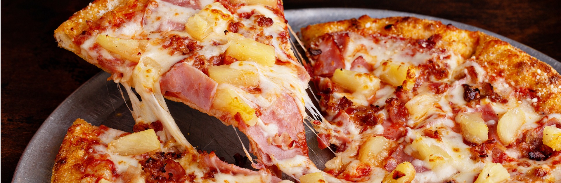 hawaiian pizza with ham and pineapple picture id1349383878